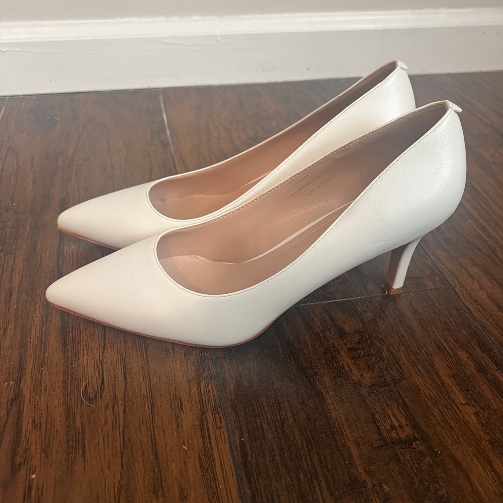 Ivory Point Toe Pumps